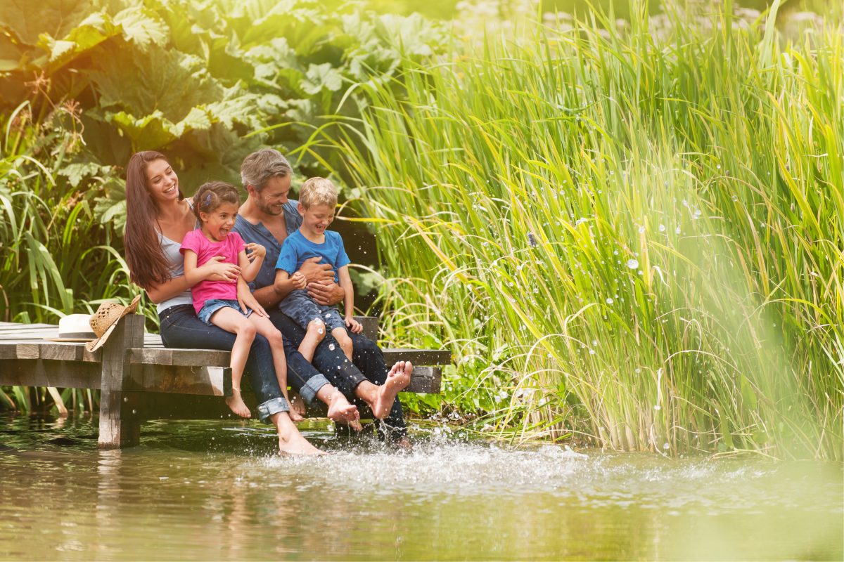 Happy Family By River With Septic Tank Converter